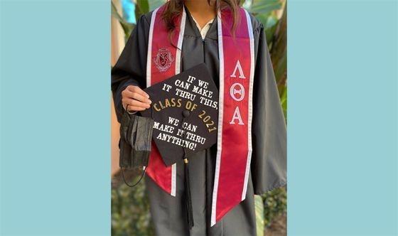 graduating seniors with custom stoles for graduation
