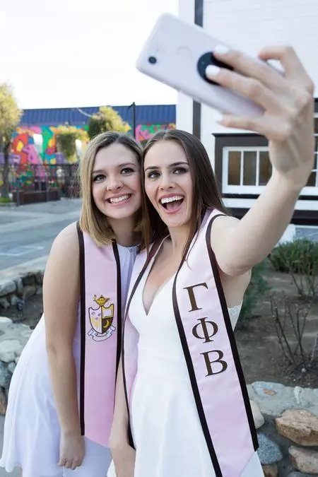 Selfie Saves - Grads posing in stoles